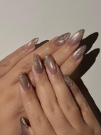 Luxury Cat Eye Press On Nails. Luxury Gold Foil Trim Fake Nails. Elegant Nude Shimmer Nails for Wedding and Formal Events. OC1293HC